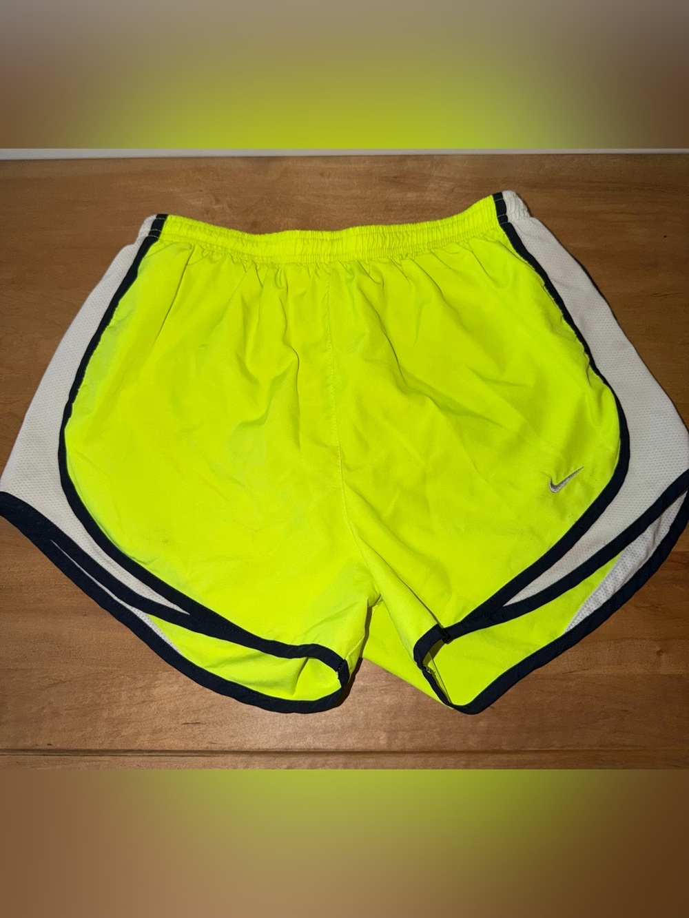 Nike Women’s Neon Yellow Athletic Shorts with navy blue Trim